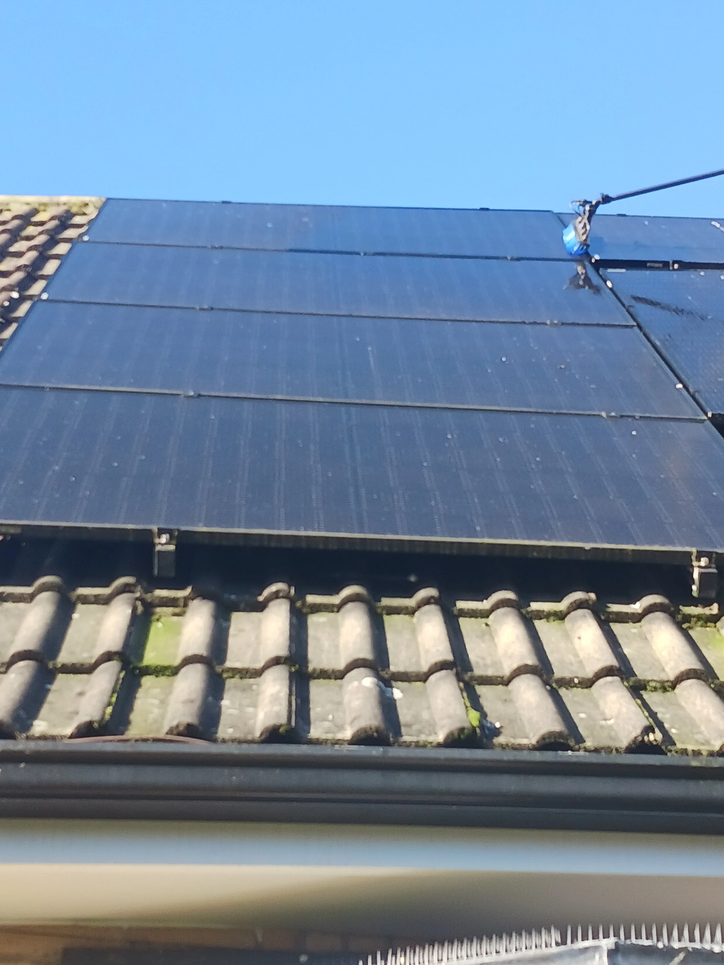 A solar panel on the roof of a building.