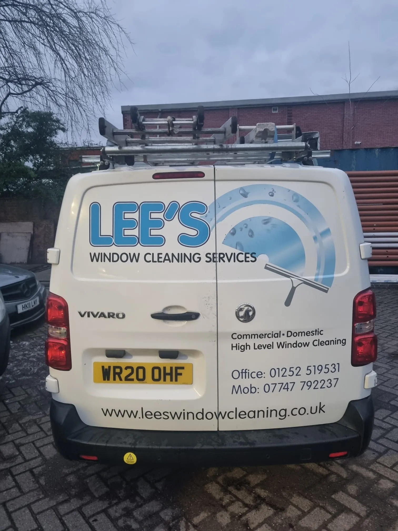 A van parked on the side of the road.